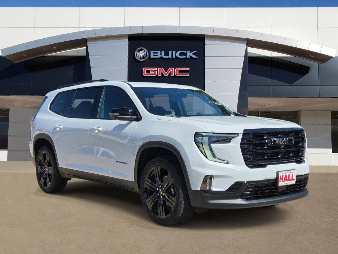 2026 GMC Acadia Elevation in Summit White — front three-quarter view