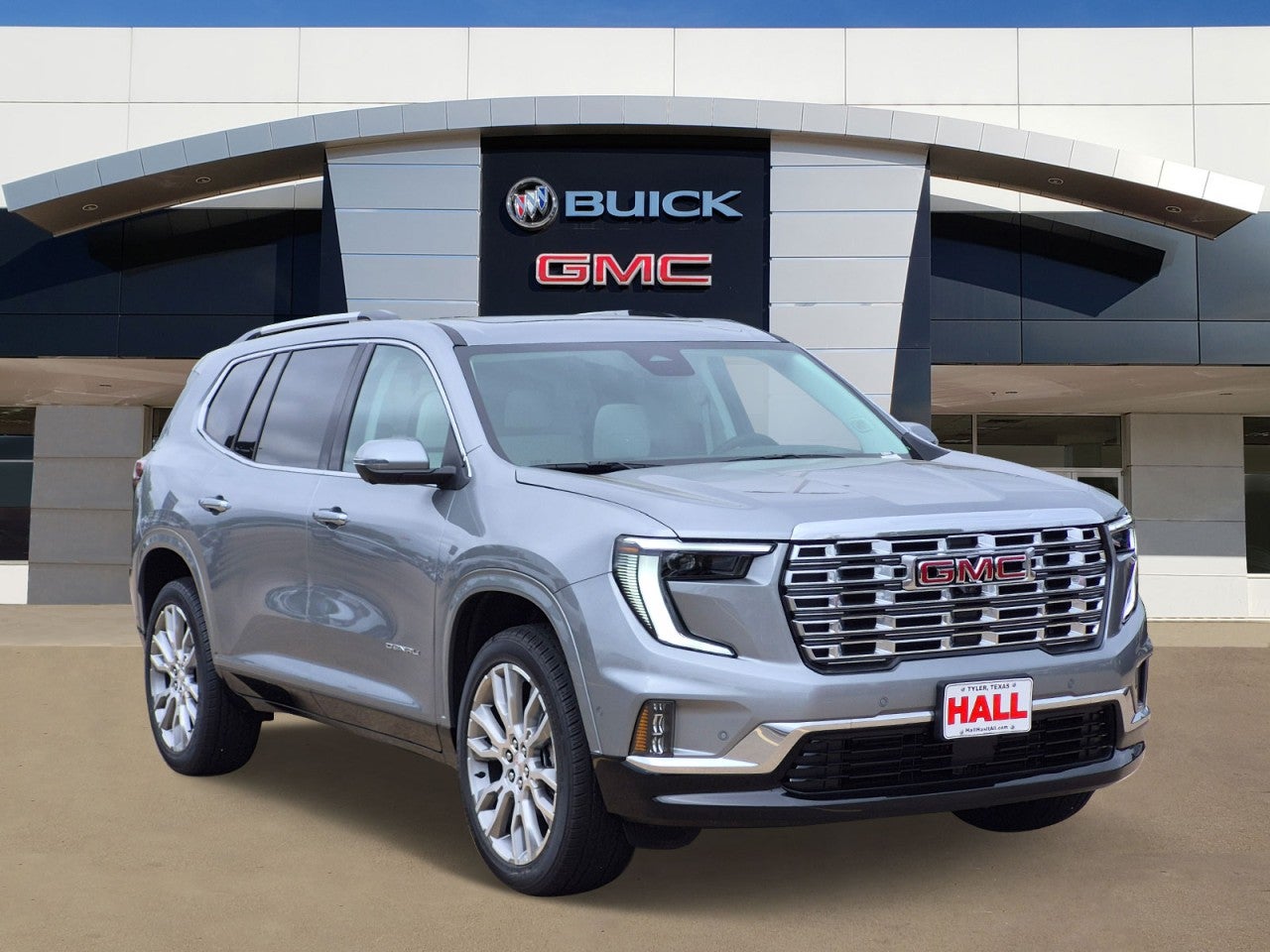2026 GMC Acadia Denali in Sterling Metallic — front three-quarter view