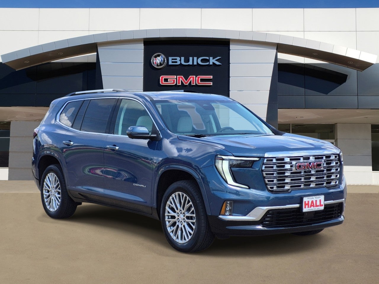 2026 GMC Acadia Denali in Downpour Metallic — front three-quarter view
