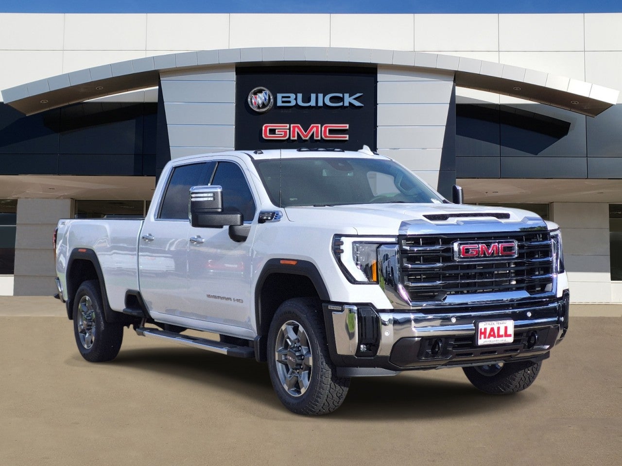 2026 GMC Sierra 2500 HD SLT in Summit White — front three-quarter view