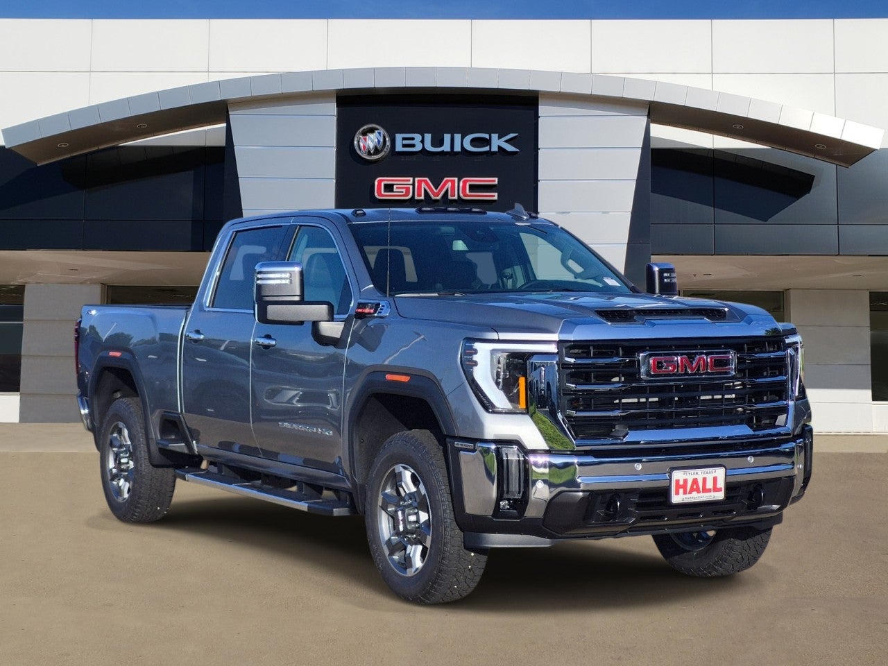 2026 GMC Sierra 2500 HD SLT in Sterling Metallic — front three-quarter view