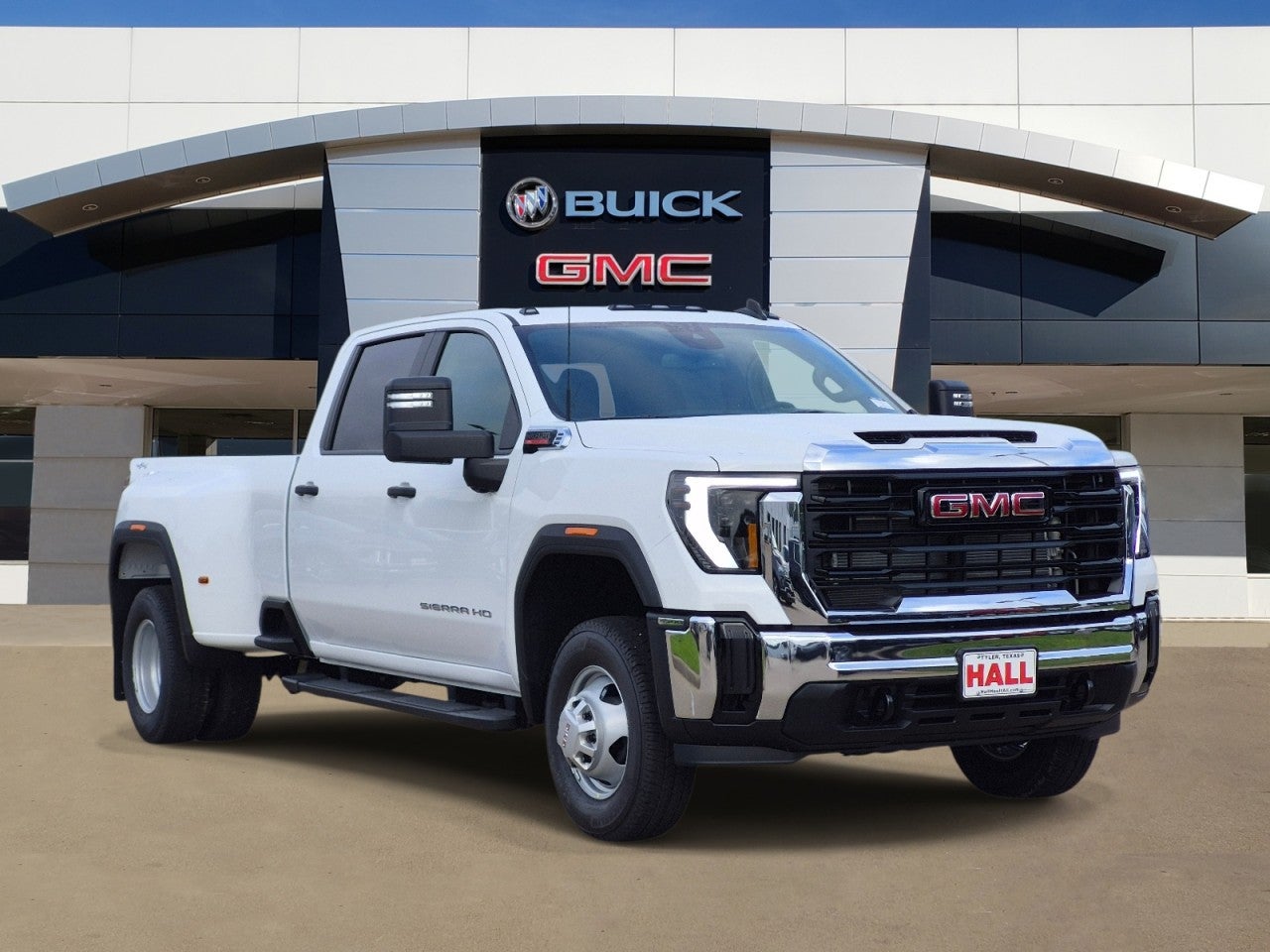 2026 GMC Sierra 3500 HD SLE DRW in Summit White — front three-quarter view