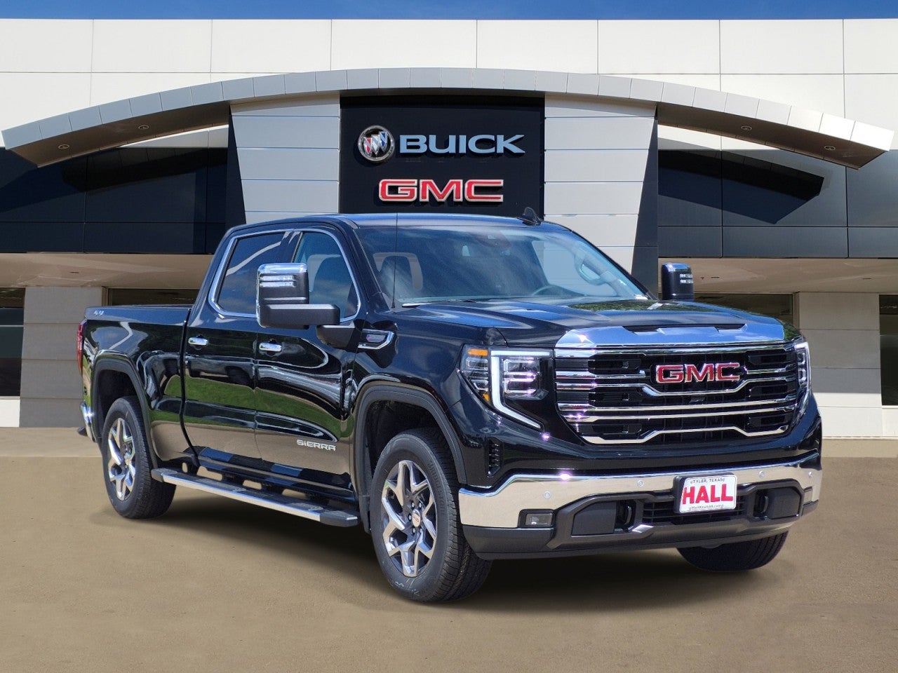 2026 GMC Sierra 1500 SLT in Onyx Black — front three-quarter view