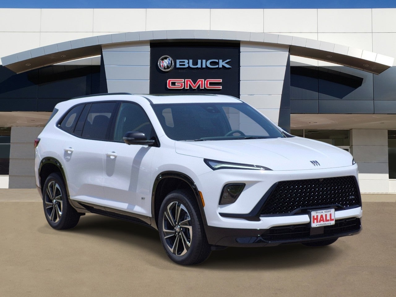 2026 Buick Enclave Sport Touring in Summit White — front three-quarter view
