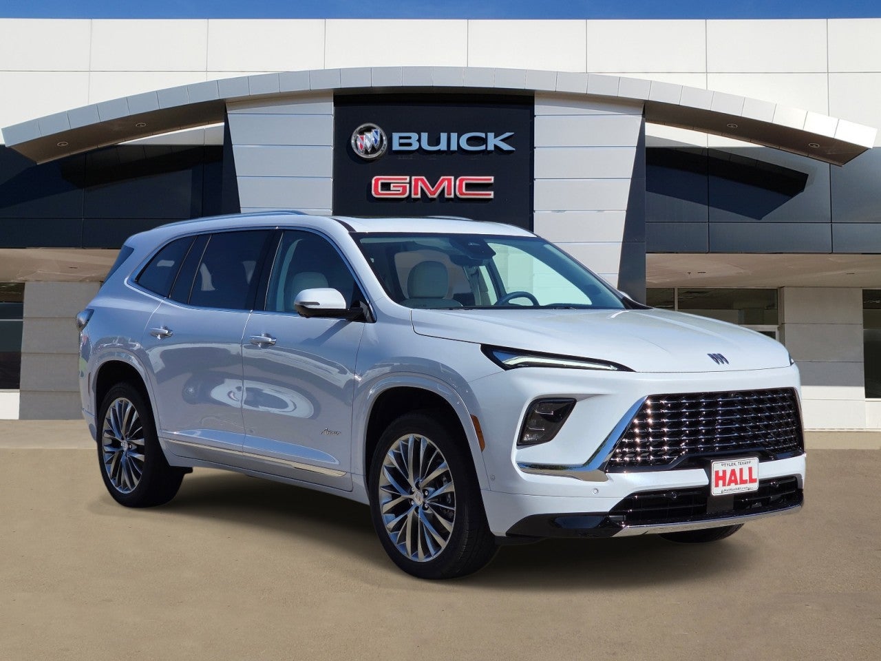 2026 Buick Enclave Avenir in Iridescent White Tricoat — front three-quarter view