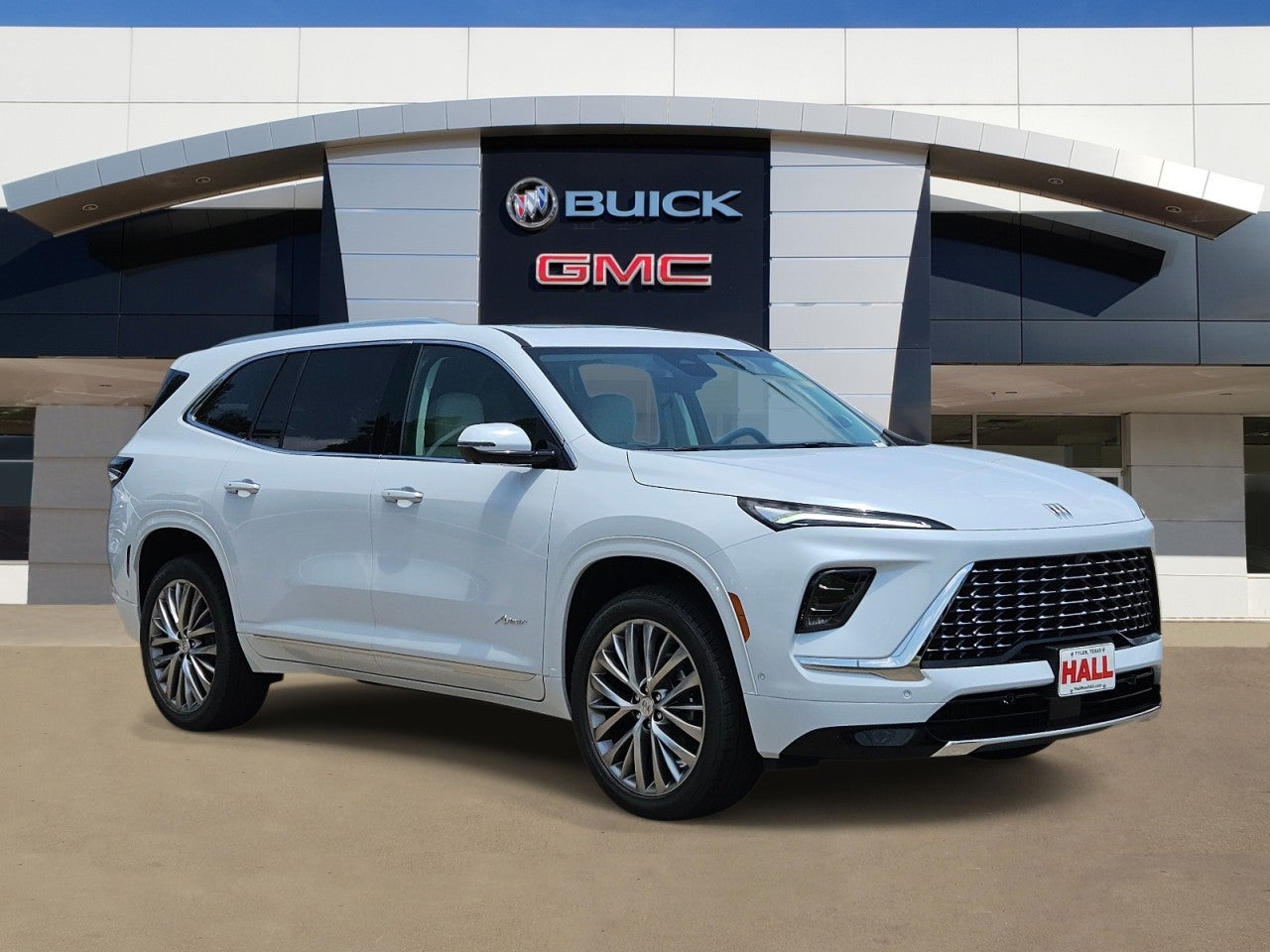 2026 Buick Enclave Avenir in Iridescent White Tricoat — front three-quarter view