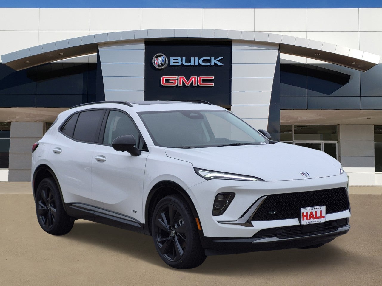 2026 Buick Envision Sport Touring in Summit White — front three-quarter view