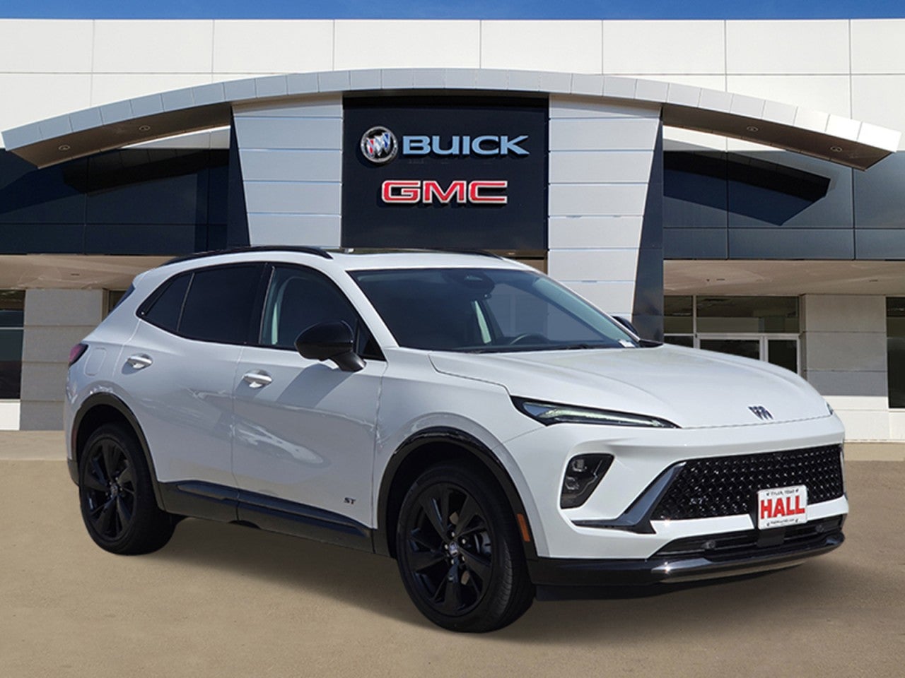 2026 Buick Envision Sport Touring in Summit White — front three-quarter view
