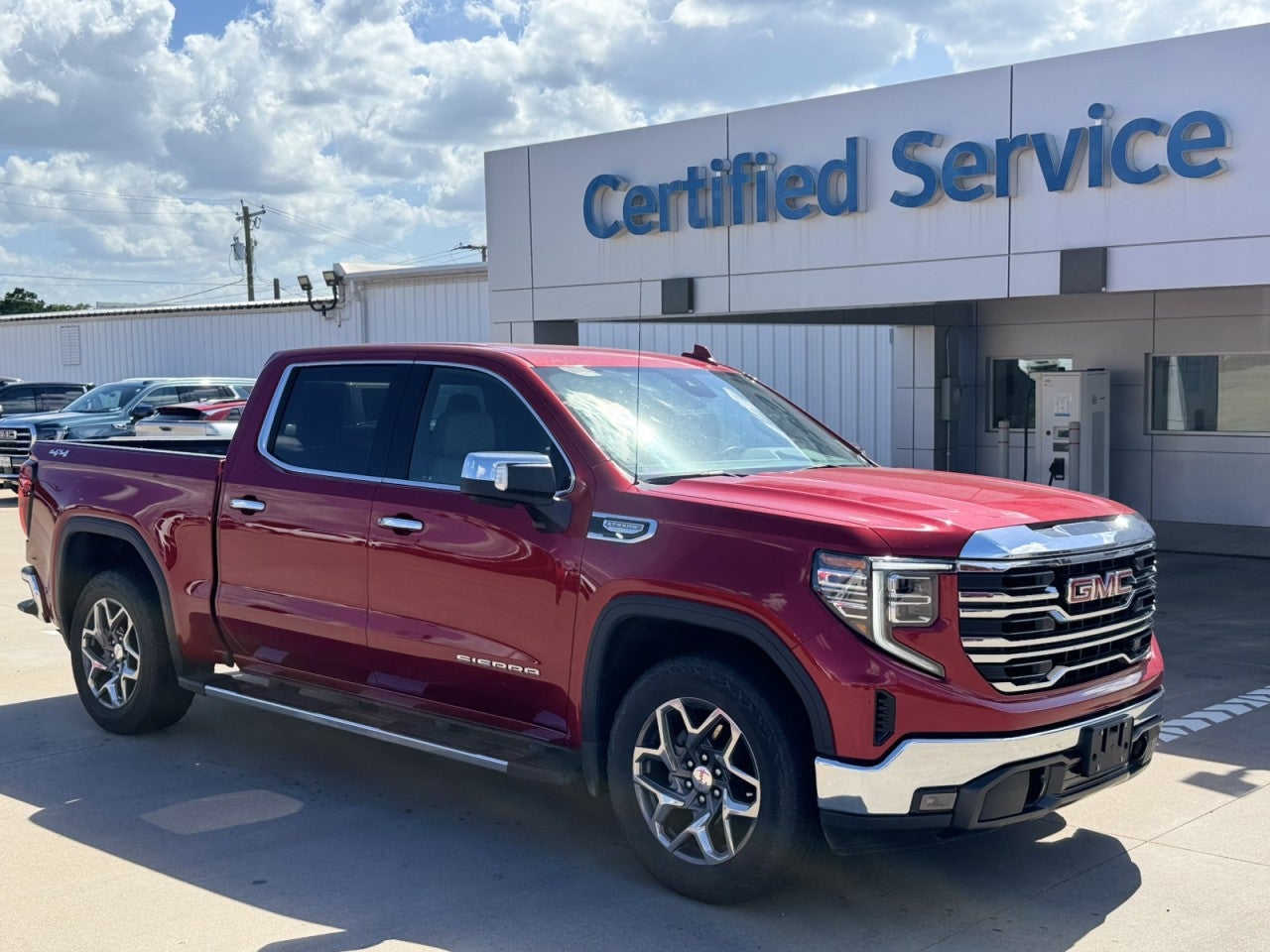 2022 GMC Sierra 1500 SLT in Cayenne Red Tintcoat — front three-quarter view